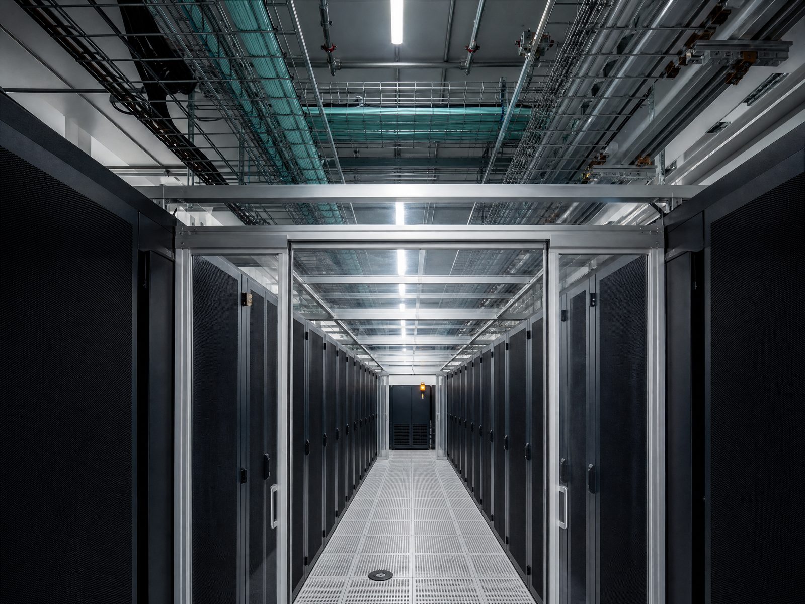 Server cabinets with containment panels in a data center aisle